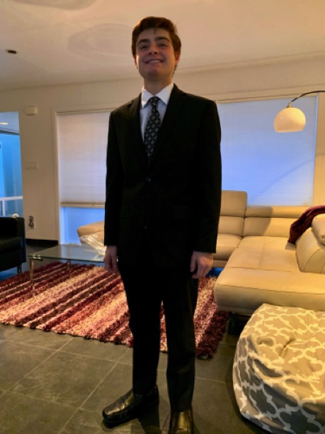 Getting Ready for his First Dance